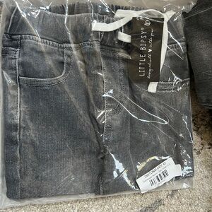 New in bag size 4-5 distressed grey jeans
